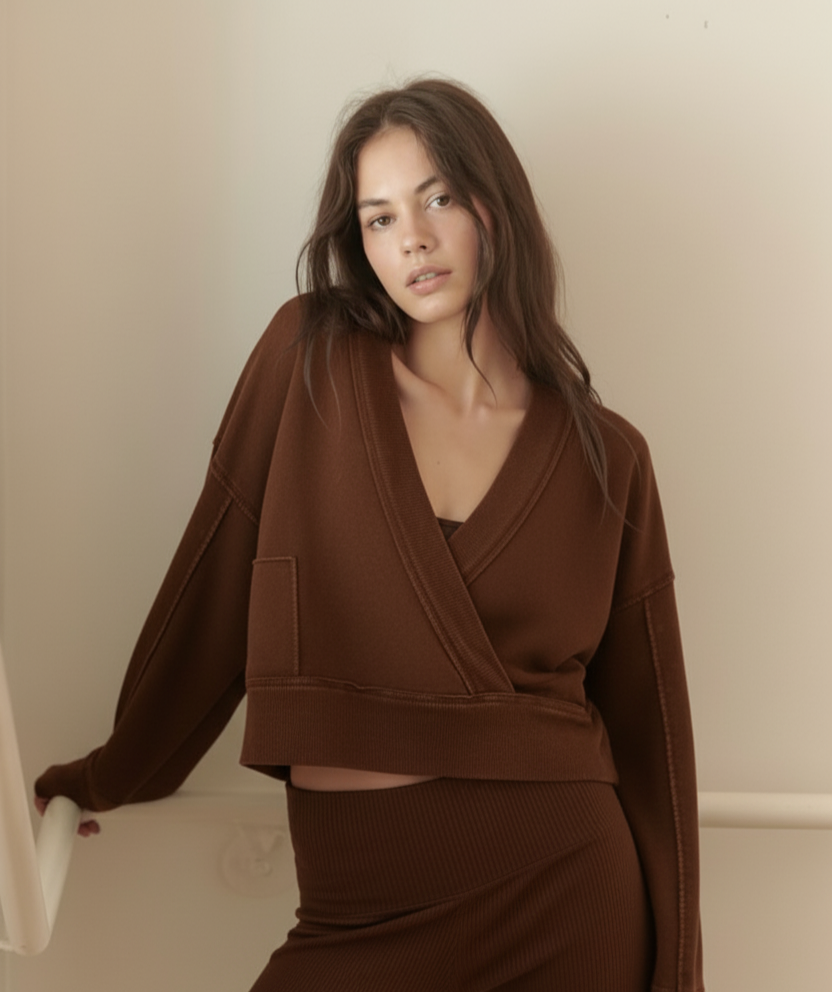 The perfect transitional piece, This stylish wrap sweater .